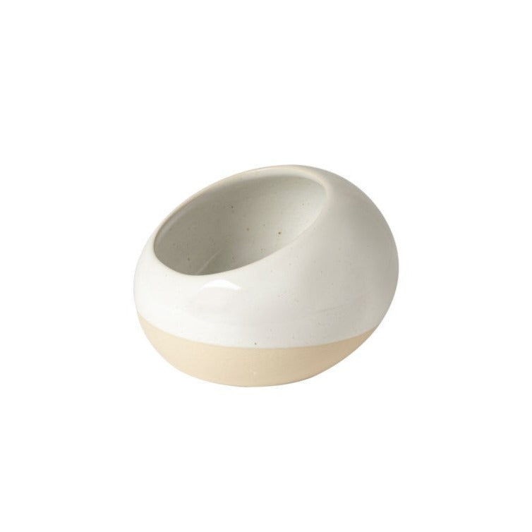 two tone glazed stoneware salt cellar; white speckled glaze with unglazed natural bottom.  One white background