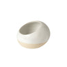two tone glazed stoneware salt cellar; white speckled glaze with unglazed natural bottom.  One white background