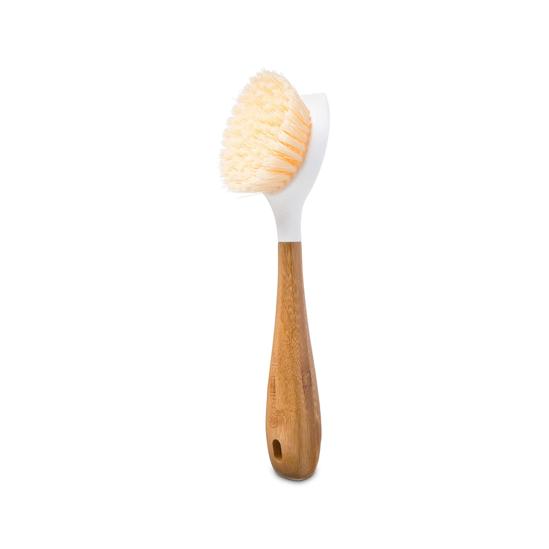 side view of white dish brush with bamboo handle by full circle