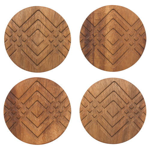 four circle wood coasters with geometric design carved  on. 