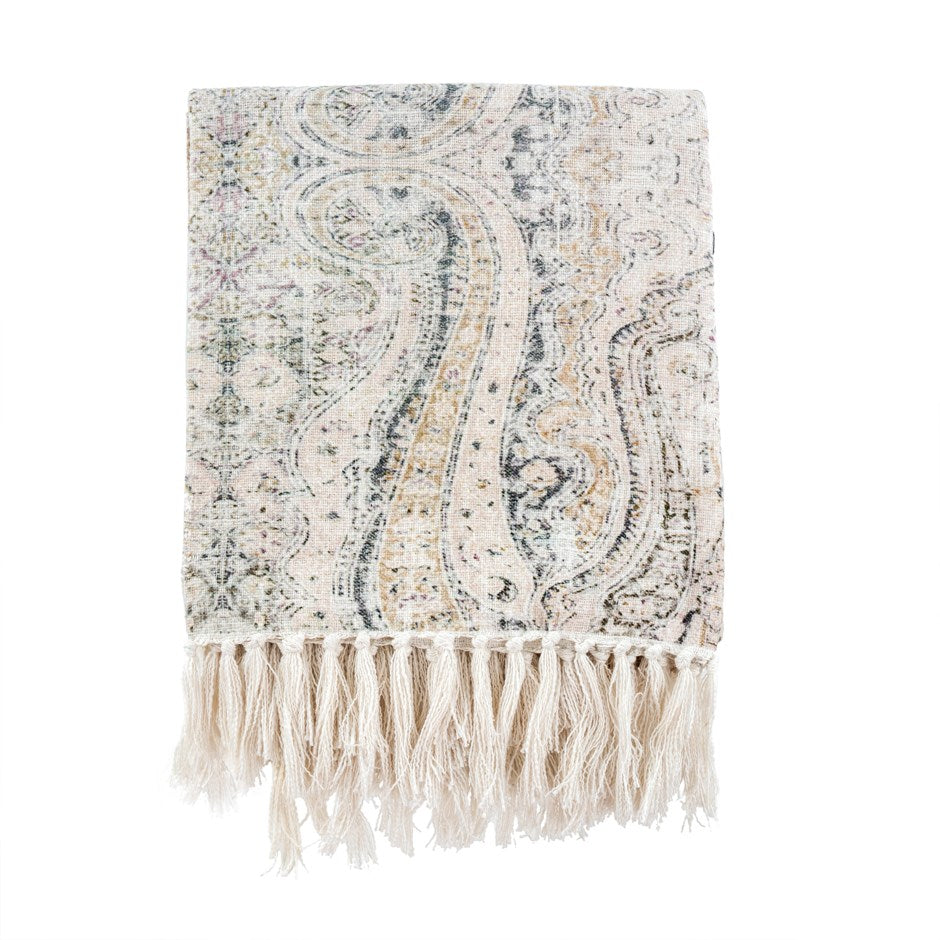 off white blanket with very pale blue and yellow paisley design  and tassels