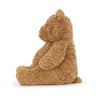 side view of big fluffy brown bartholomew bear stuffed plush toy made by jellycat