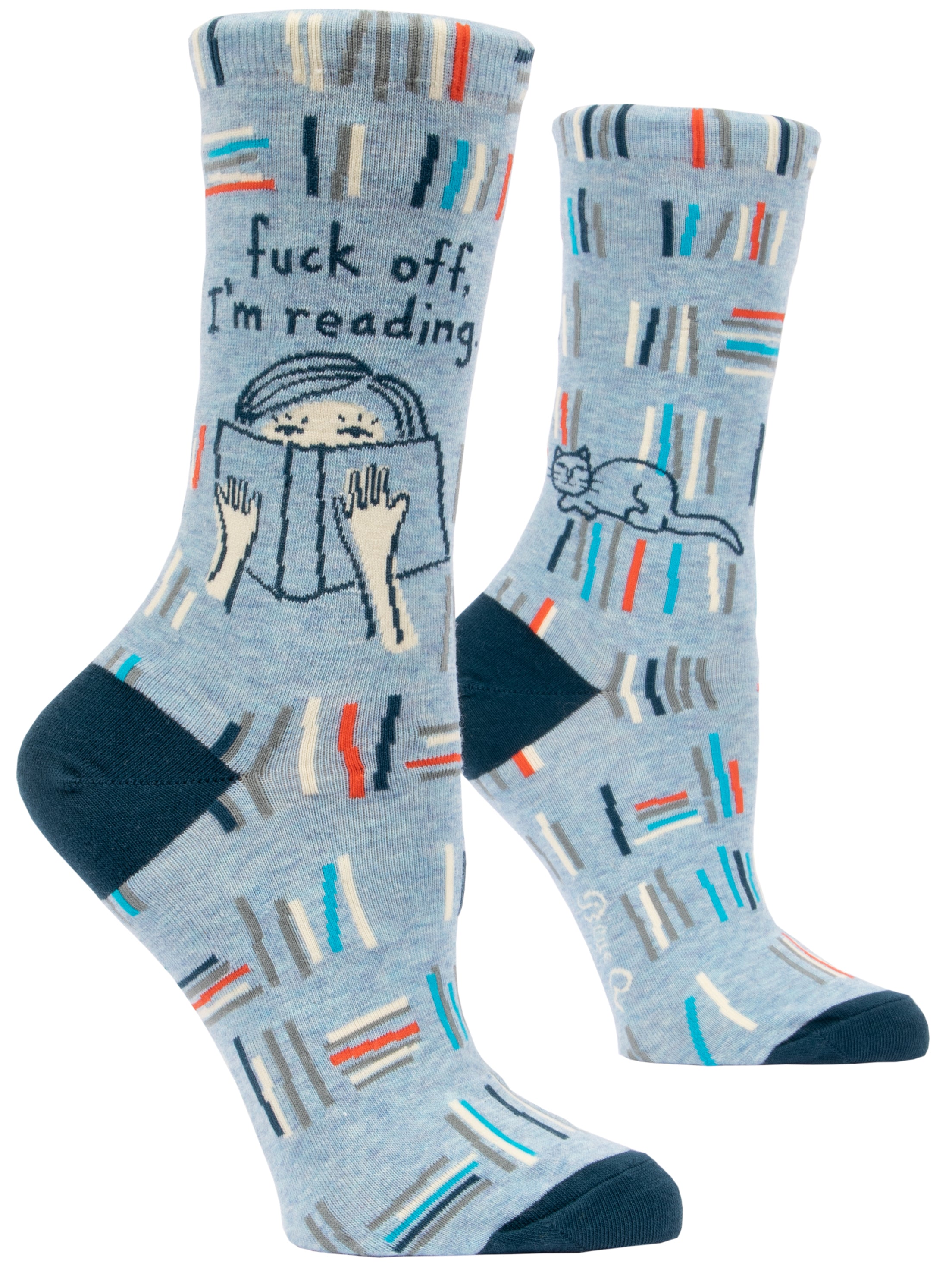 blue socks with multicolour books and a cartoon of  a cat and someone reading above it says fuck off, i'm reading